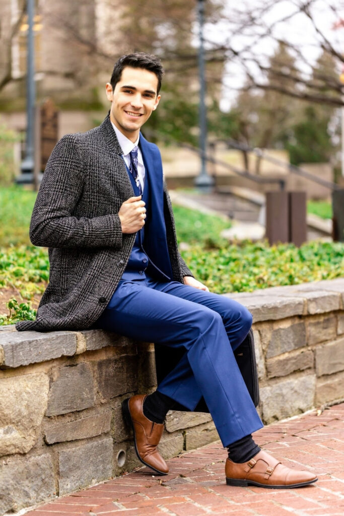 Jack Shaw, in a blue suit and wool jacket