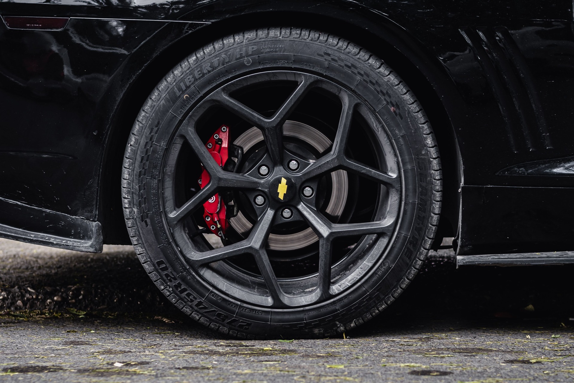 Closeup of a car tire and brake disc