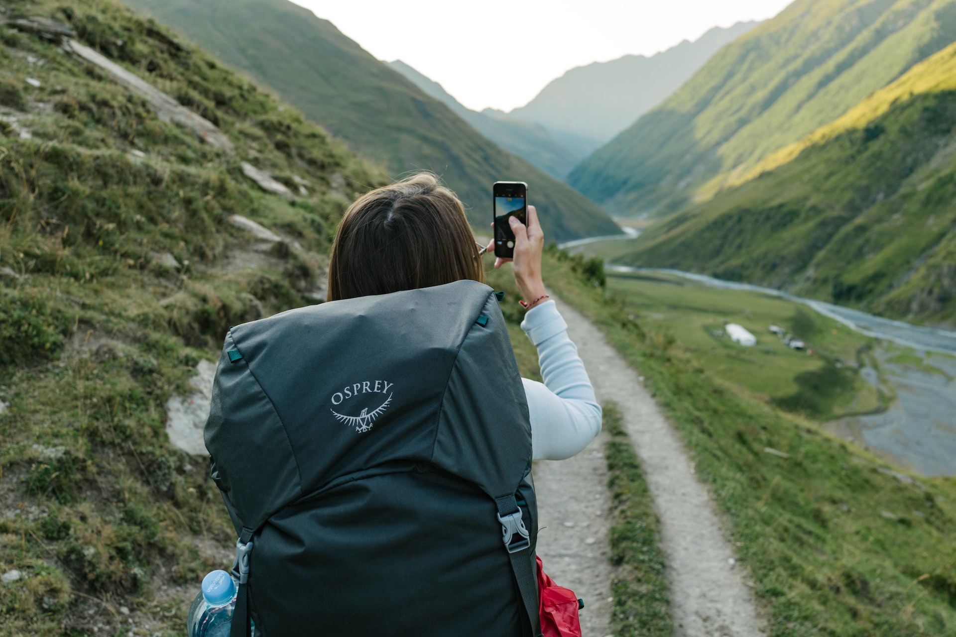 Woman on backpacking trail.