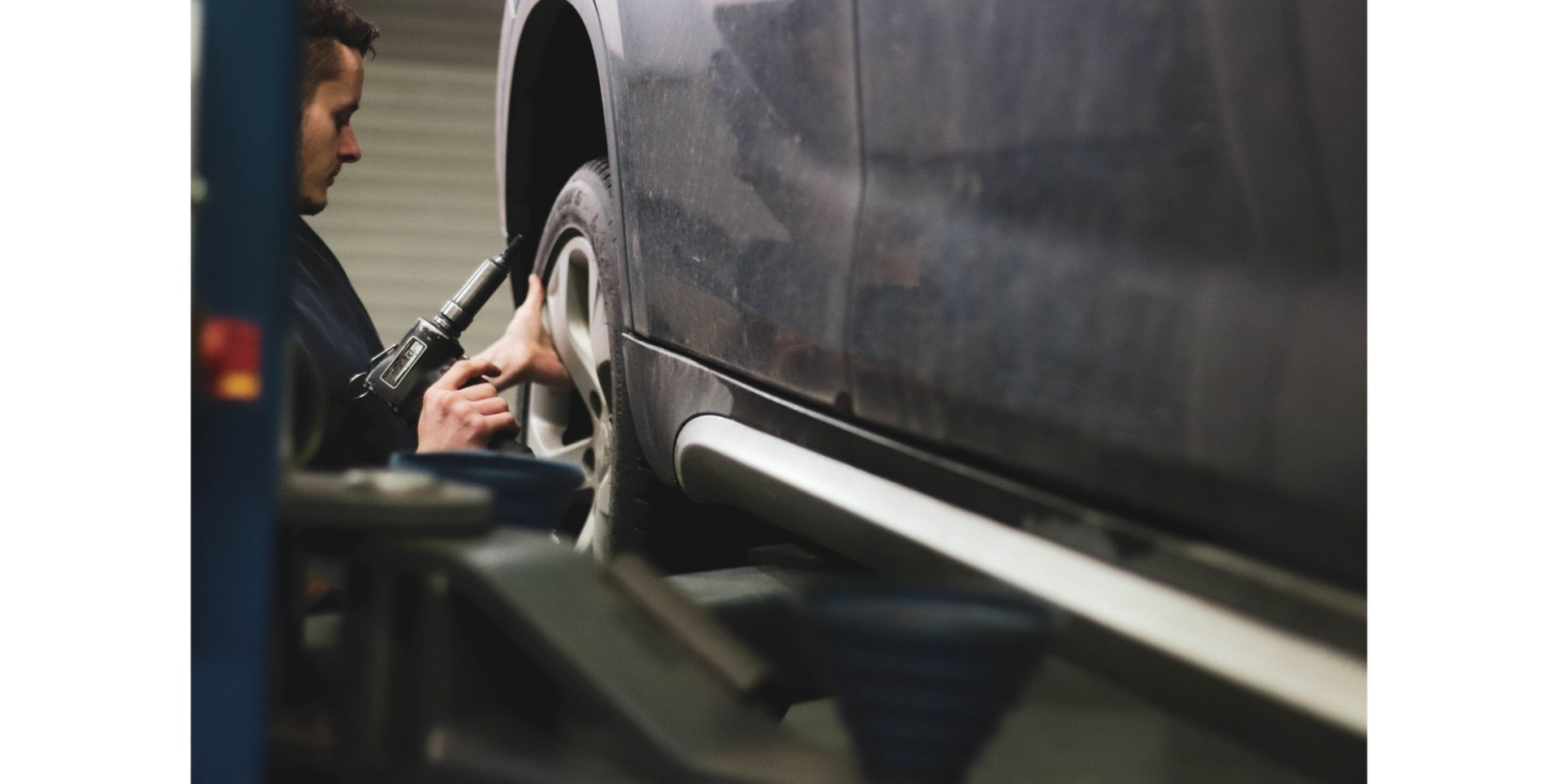 Man working on a car.