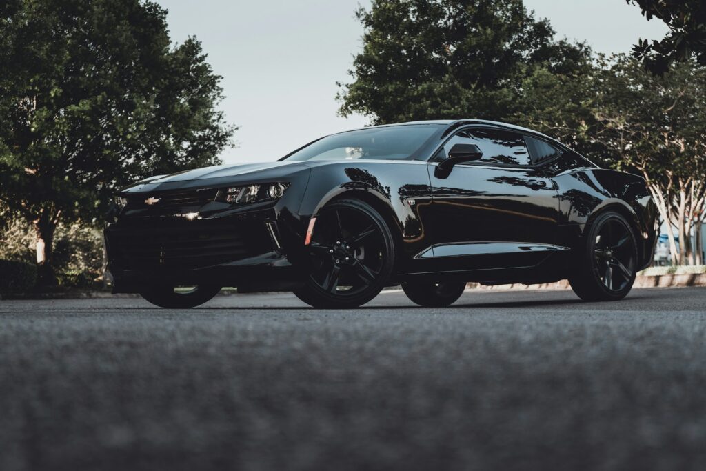 Black Porsche on the Roadway