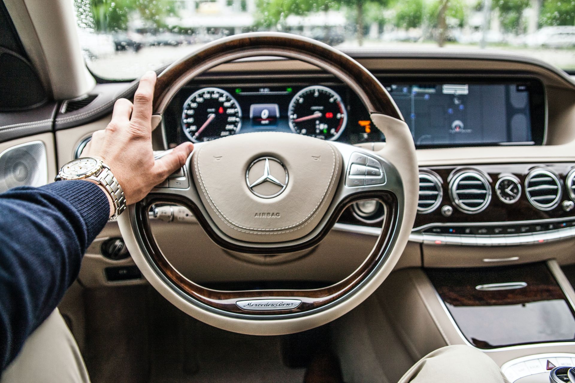 Behind the wheel of a car.