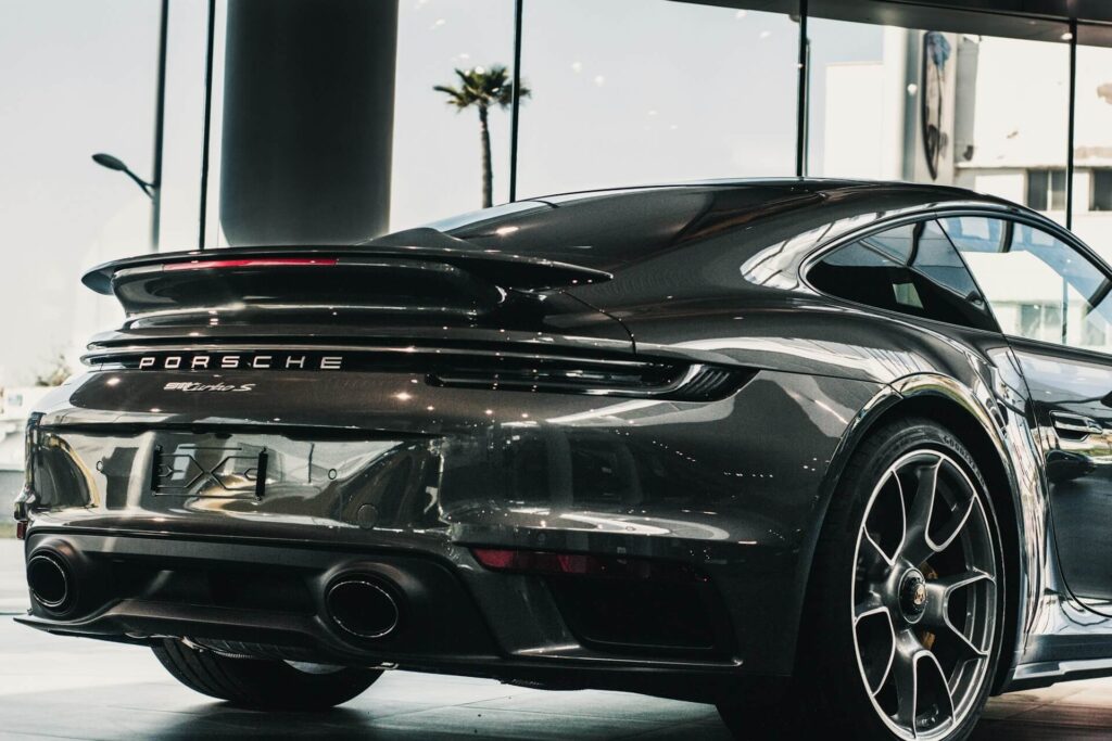 Black Porsche 911 in a parking lot