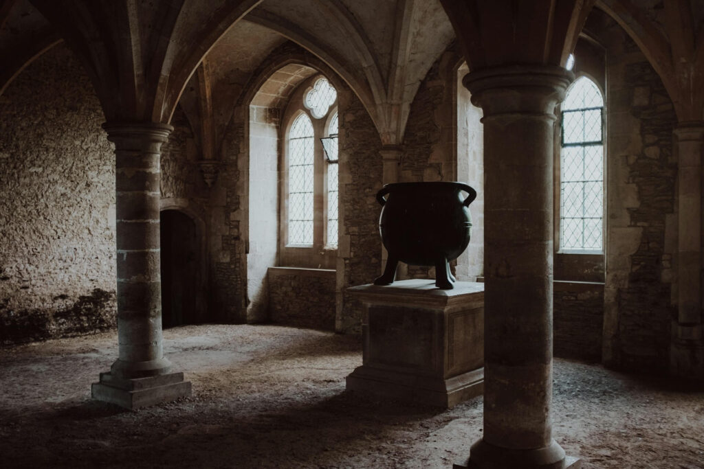 cauldron in an empty room in an old building