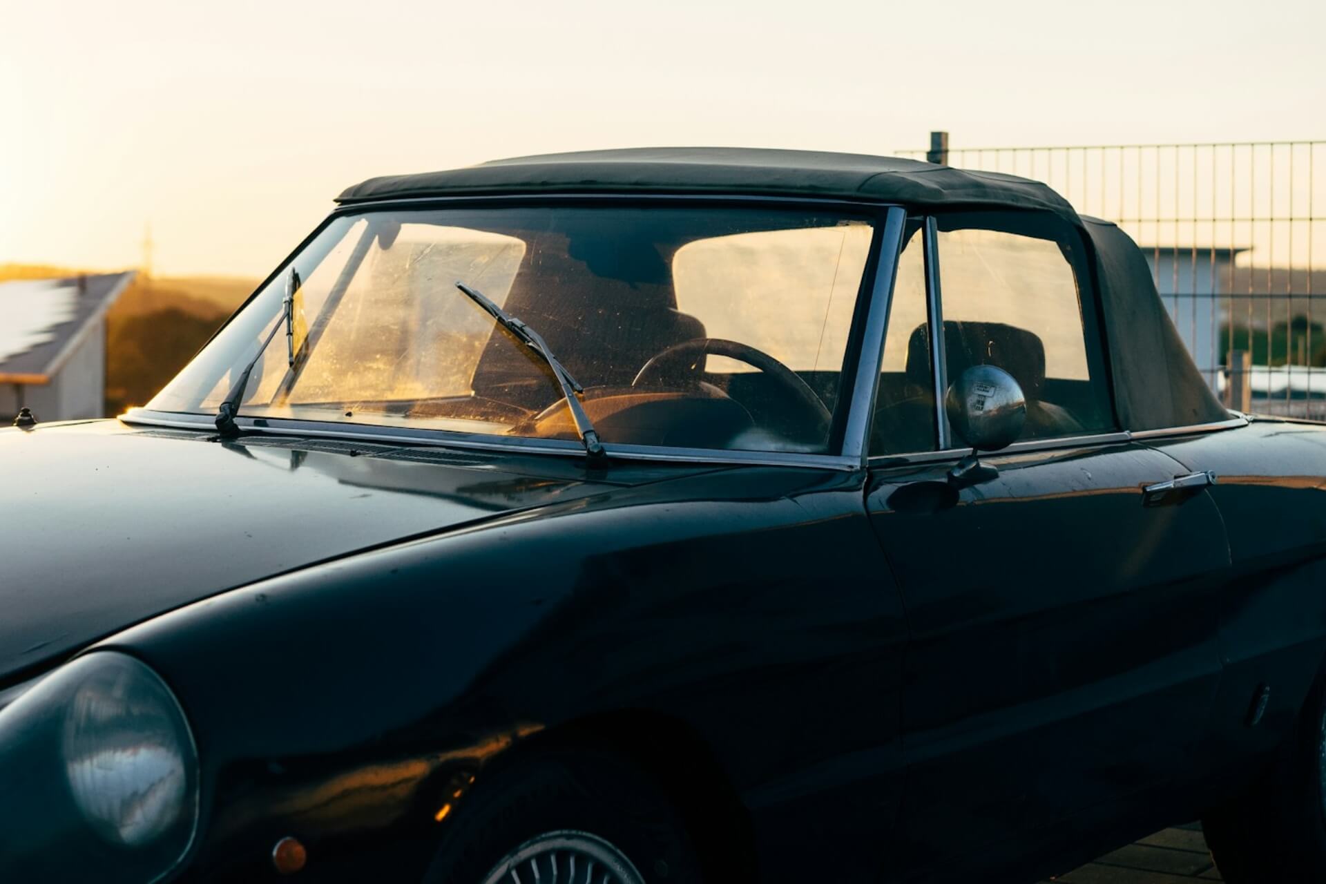 Classic car with raised windshield wipers