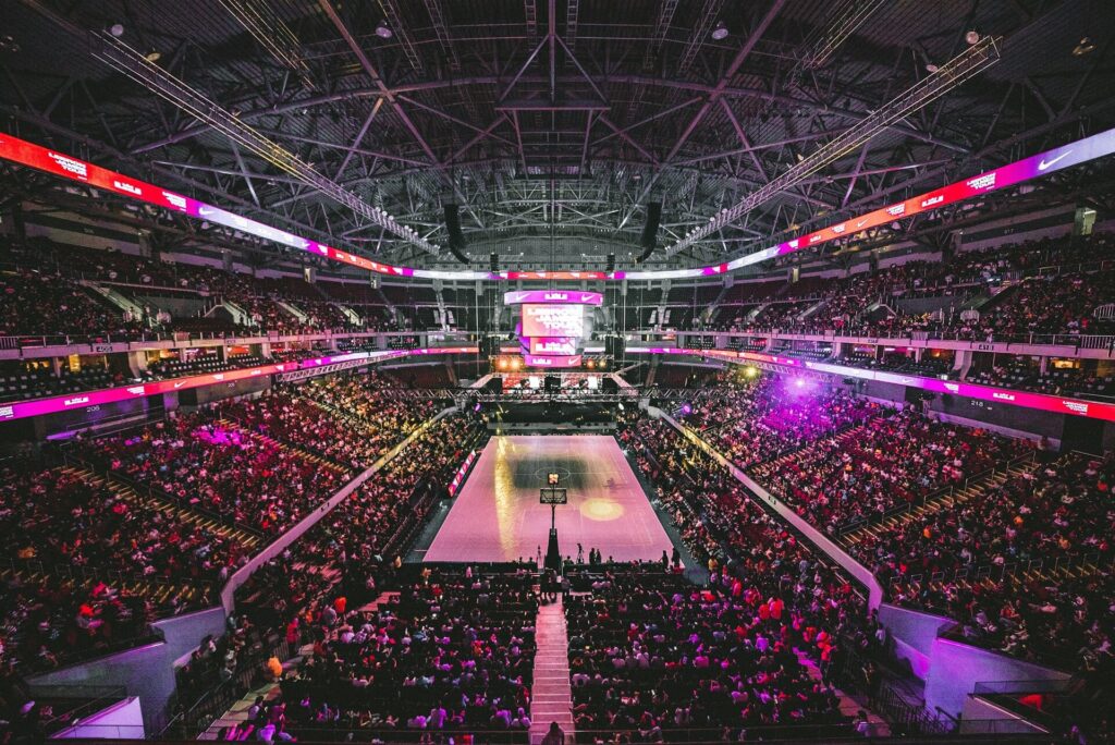 Full basketball arena awaiting a game