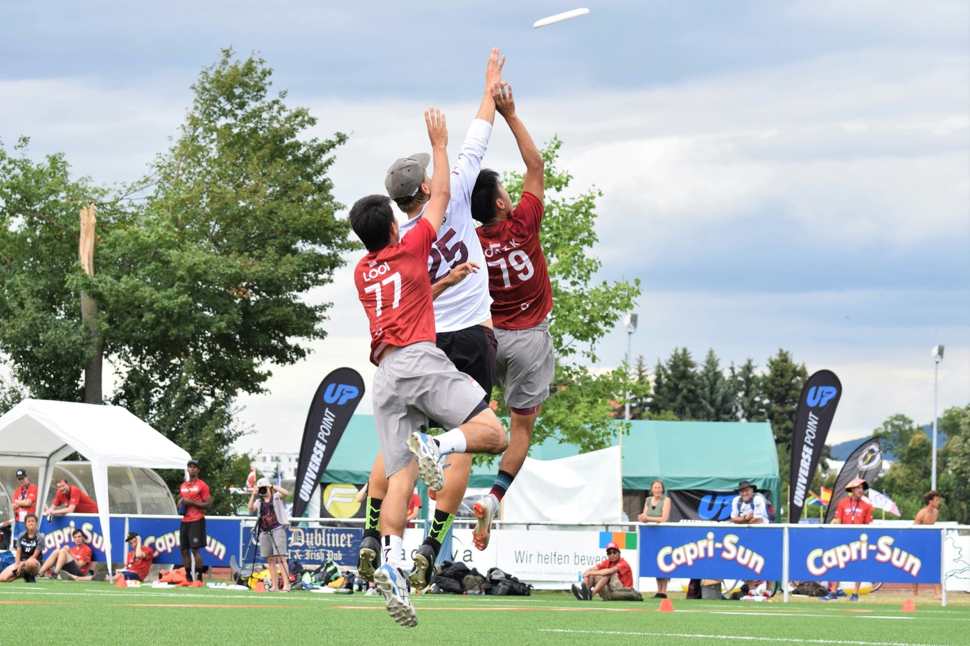 A group playing ultimate frisbee