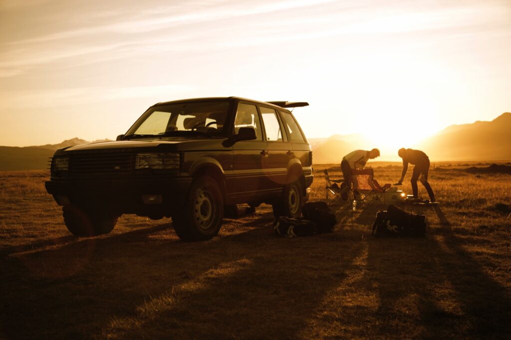 SUV parked at a campsite