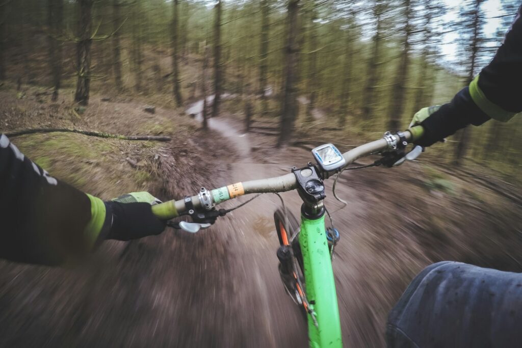 POV shot of a mountain biker at high speeds