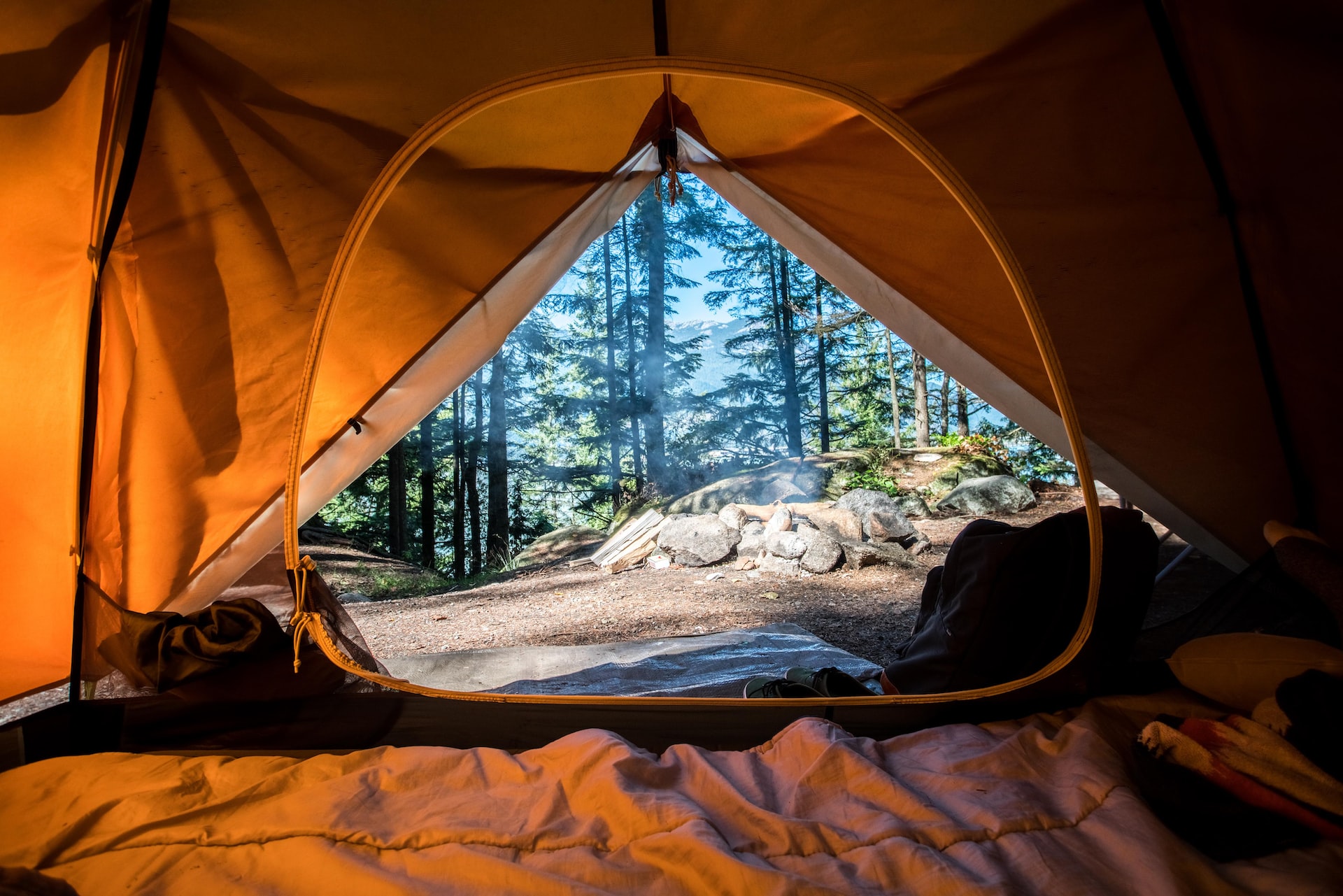 Interior of a tent, looking out.