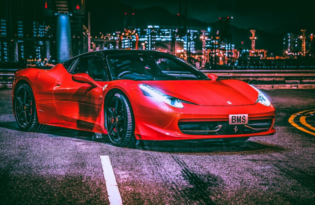 Red Porsche Parked on Parking Lot