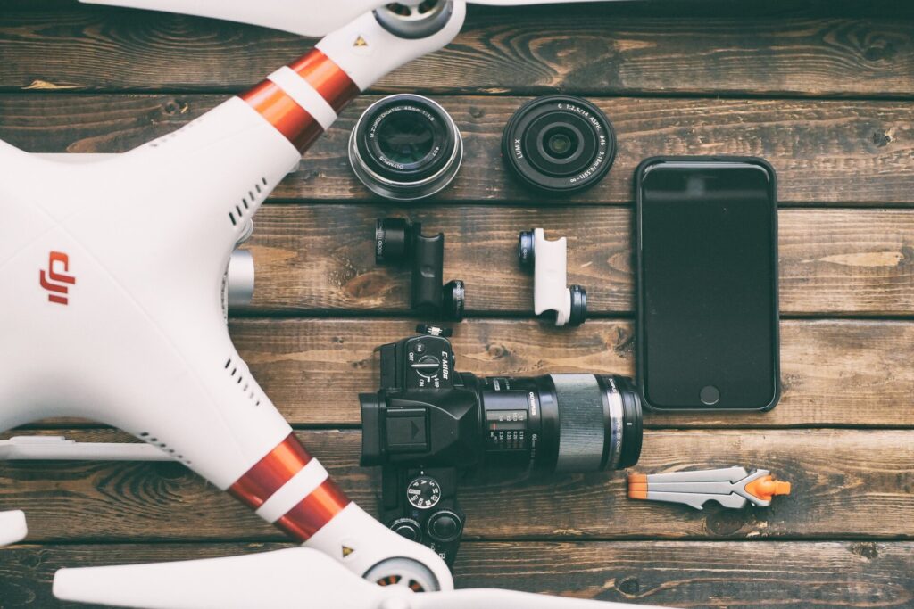 Drone with camera equipment and phone on a table