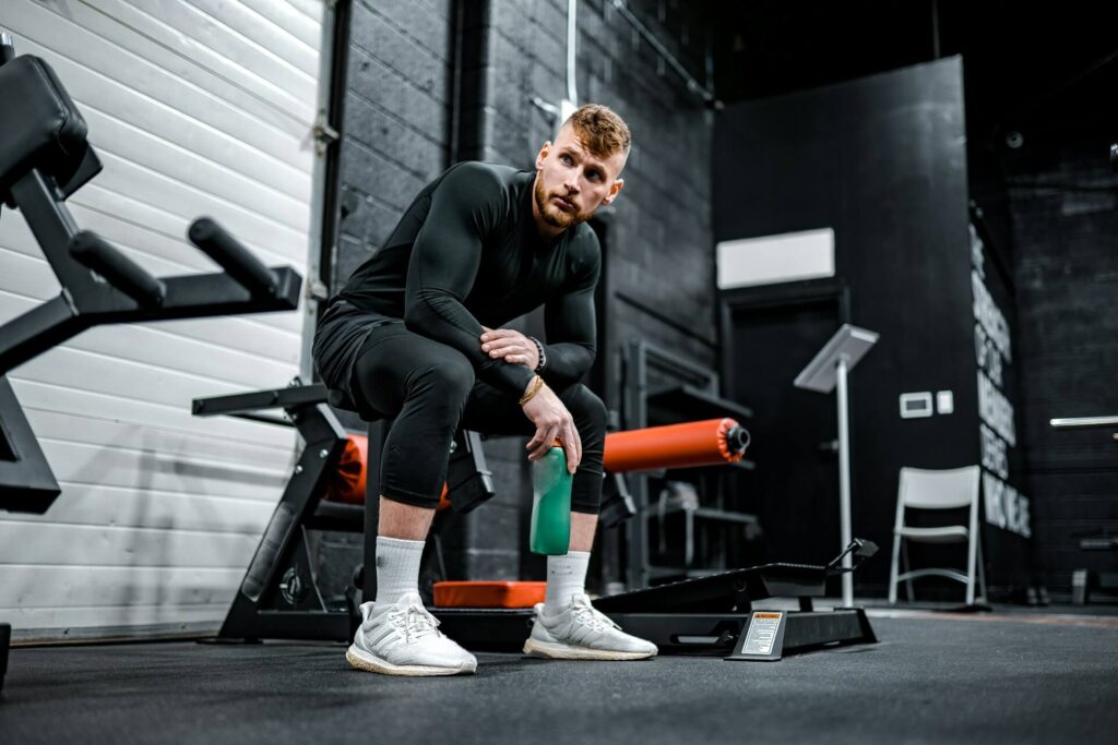 Man sitting in a gym