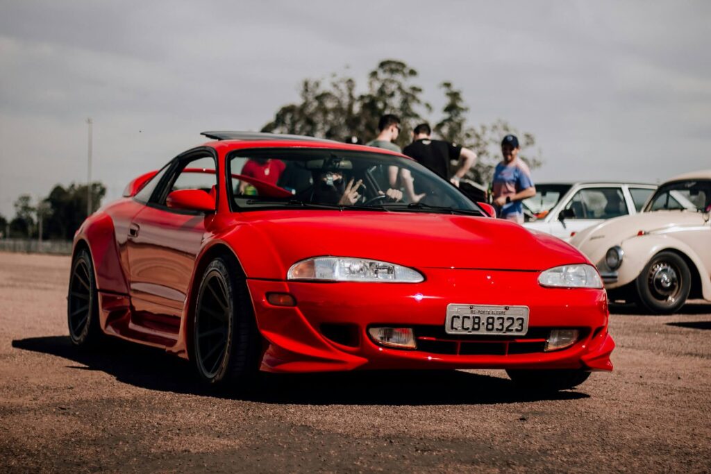 A red Mitsubishi Eclipse in a parking lot